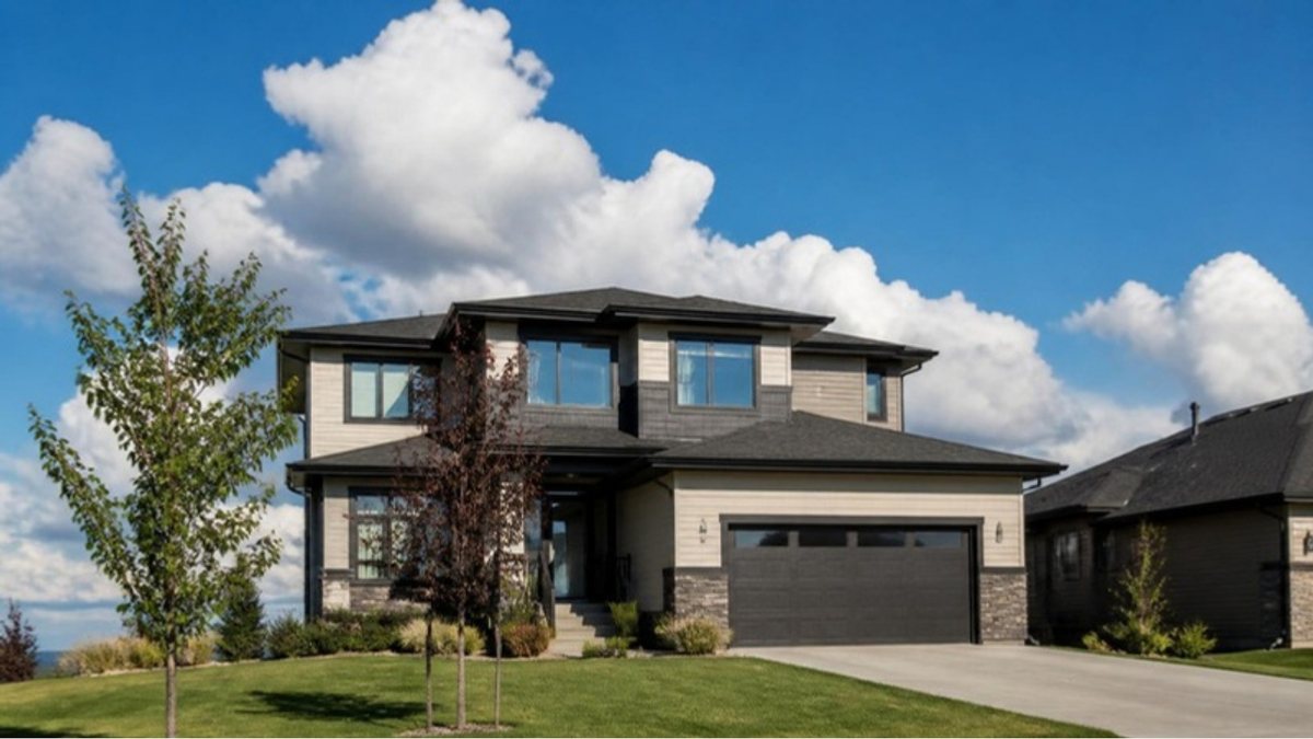 Modern two-storey home in an Alberta suburb under a big prairie sky