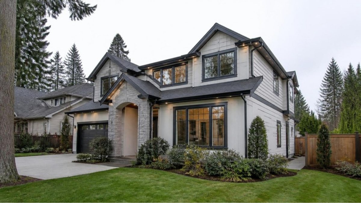 Large detached Surrey home with a side entrance to a basement suite